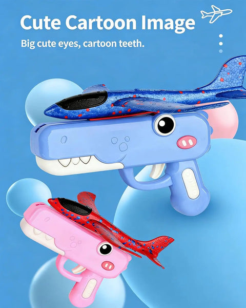Blue and pink Dinosaur Foam Glider Launcher Toy with 8 inch foam gliders and cartoon design on blue background.