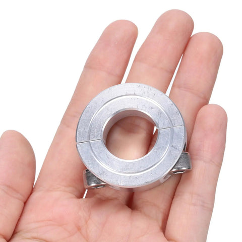 Person holding a Four Piece Double Split Clamp-On Shaft Collar For 3/4 Inch Shaft, Two-Piece Aluminum Alloy Collar With Set Screw, 1-1/2 Inch Outer Diameter, 1/2 Inch Thick