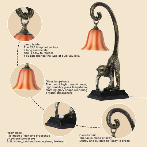 Cool Gold Finish Modern Resin Standing Monkey Table Lamp with glass lampshade and die-cast tail, shown on a beige background.