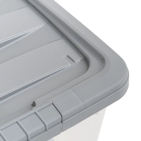 Close-up of a secure latching lid on a Straight Up Heavy Duty 32 Quart Clear Storage Bin.