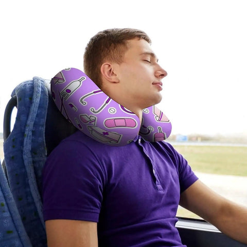 Man using Nurse Pattern Purple U Shape Memory Foam Neck Pillow Travel Pillow For Airplane Car And Home Office Sleeping Super Lightweight Portable Headrest For Super Comfy Neck Support on bus seat