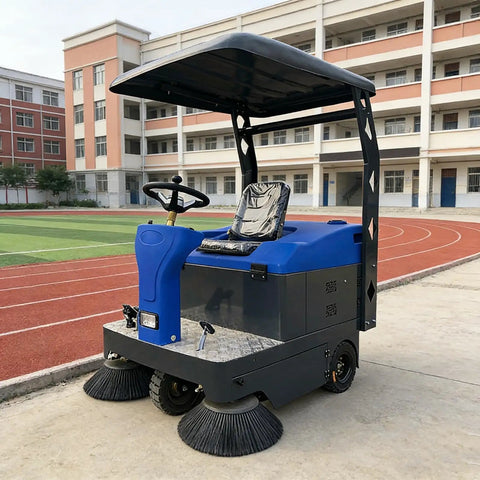 Heavy Duty Ride On Floor Sweeper For Industrial Use featuring a blue and black design, efficient for factory cleaning tasks.