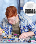 Massive 365 Piece M2.5 Nylon Hex Spacer Standoff Kit With Male And Female Studs Washers Screws And Nuts For PCBs Motherboards Circuits Electrical Switches And Receptacles on PCB repair bench