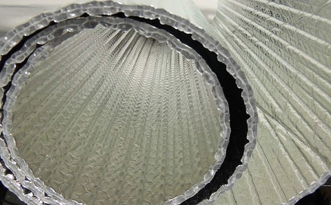 Close-up view of Double Bubble Reflective Foil Insulation Roll, showcasing bubble pattern and edging for efficient insulation.