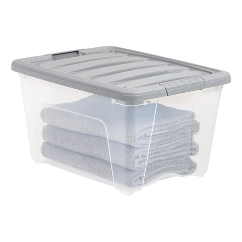 Straight Up Heavy Duty 32 Quart Clear Storage Bins With Secure Latching Lids Stackable Organization Containers Hella Rock Solid Design Completely Hassle Free For Moving Day And Pantry Needs Set Of Six with folded towels inside.