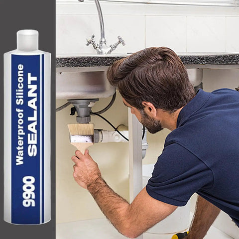 Man applying Tough As Nails Heavy Duty Waterproof Sealant Polymer Bonding Adhesive Multi Material Caulk under a sink.