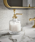 Artifacts Soap Dispenser Assembly For Kitchen And Bath, Heavy Duty Metal Build With Glass Reservoir on marble countertop