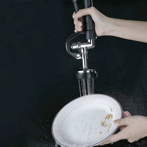 Pro Grade Pre Rinse Spray Valve With 38 Inch Flexible Stainless Steel Hose cleaning a plate in commercial sink