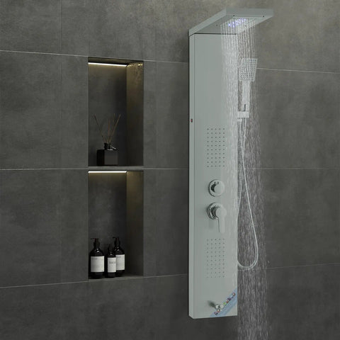 Slick Stainless Steel Shower Panel Tower Featuring Five Kickass Spray Modes, Smooth Knob Control, Rainfall Showerhead, Waterfall Stream, Dual Body Massage Jets, Bathtub Spout, And Handheld Sprayer Kit on a modern wall.