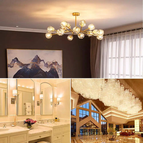 Chandelier and lamps illuminating luxurious bathroom and hotel lobby