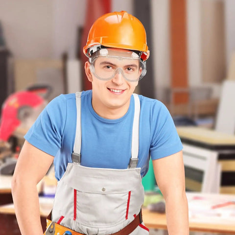 Badass Protective Safety Goggles With Anti Fog Clarity And Scratch Resistant Lenses worn by a worker during construction tasks.