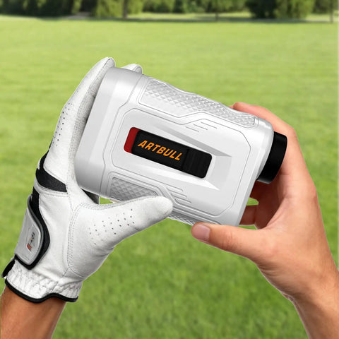 Ready To Roll Golf Rangefinder With Slope Compensation And Pin Lock Vibration Hits 650 Yard Mark held in gloved hand on green grass.