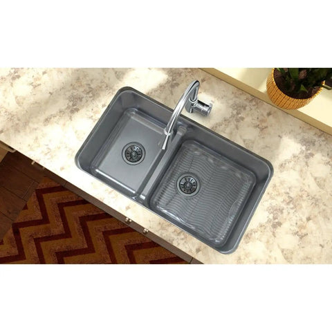 Double-basin kitchen sink top view with stainless steel bottom grid, 14.25 inch square, corrosion resistant build visible.