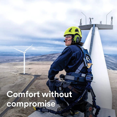 Worker with SecureFit Climbing Style Safety Helmet With 6 Point Suspension System on wind turbine, construction job site.