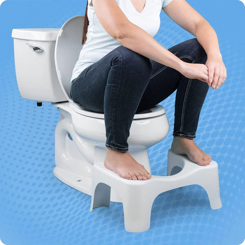 Front view of white 7-inch plastic Squatty Potty bathroom stool used with a toilet