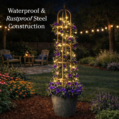 Metal Garden Obelisk Trellis For Climbing Plants Indoor Outdoor Use Powder Coated Steel Built To Last In All Weather Weatherproof And Rust Resistant Floral Pattern Antique Copper Finish Eleven Inch Diameter Seven Foot Tall Stainless Hardware with lights and climbing flowers in night garden setting