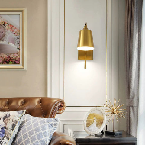 Modern Plug In Gold Wall Sconce Set Of 2 With Adjustable 180 Degree Light Heads For Bedroom And Living Room Easy Install Sleek Contemporary Look And Warm Luxe Glow mounted in elegant living room setting.