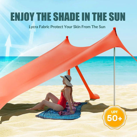 Woman relaxing under Beach Tent Sun Shelter 10x10ft UPF50 Plus Portable Shade Canopy Orange on sandy beach