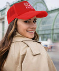 Woman wearing Cool Red Trucker Hat For Men With Adjustable Buckle The Sport Style Cap Built For Running Hiking Cycling And Everyday Wear