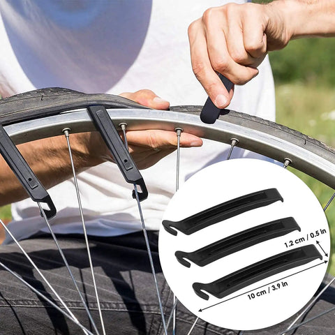Using tire levers from All In One Bike Repair Kit With 16 In 1 Multitool Tire Levers Spoke Wrench Hex Keys And Sockets For Road And Mountain Bikes Heavy Duty Chrome Vanadium Steel On The Go DIY Maintenance For Cyclists to remove bike tire