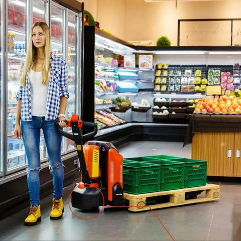 Big Budget 3300 Lb Full Electric Pallet Jack With Lithium Battery Fits Narrow Spaces with green crates in supermarket aisle.