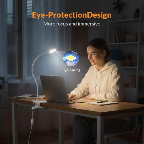 Top Shelf Clip On Reading Light With Bendy Gooseneck For Desks And Bed Rails, Slay Your Setup With Cozy LED Glow Perfect For Lazy Nights Or Fast Study Grind At Home, illuminating a woman working at a desk.