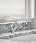 JOLT Swing Spout Faucet Without Side Spray In Metal Construction With Polished Chrome Finish, deck-mounted on marble countertop