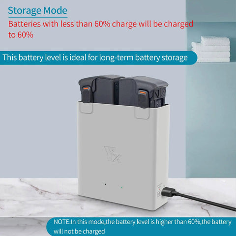 Drone Battery Charger Hub For Avata 2 showing dual batteries inserted in gray charging box on a white marble surface.