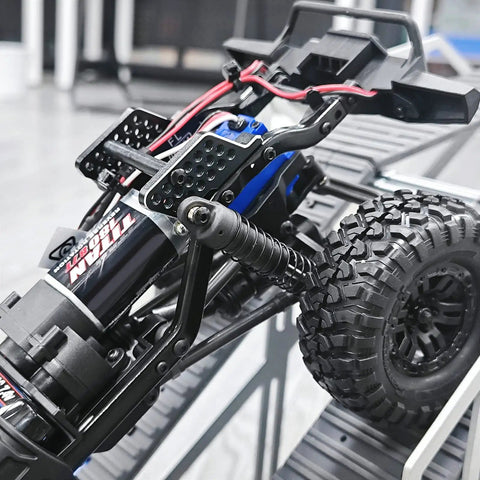 Close-up of beefy shock mount with multiple mounting positions for TRX4M Defender 1/18 RC crawler, CNC aluminum, adjustable height