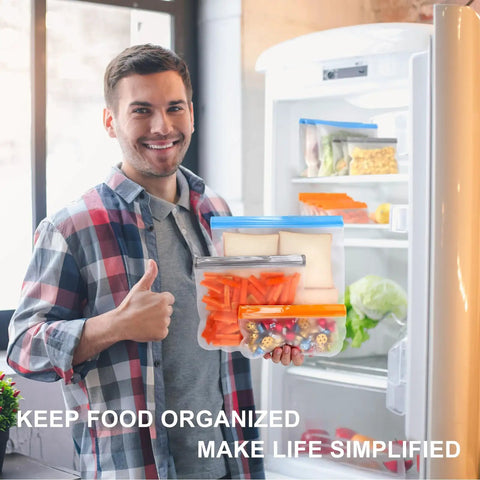 Man holding Mega 10 Pack Reusable Freezer Bags Dishwasher Safe Zero Hassle Food Storage Containers filled with snacks and veggies.