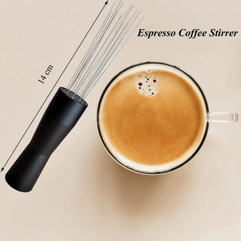 Espresso Distribution Tool Set With Needle Type Distributor and 14 cm black handle next to a cup of espresso coffee.