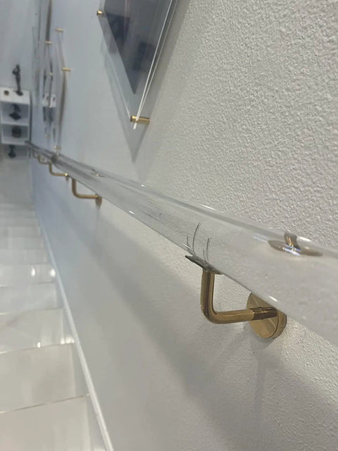 Slick Clear Acrylic Handrail Set With Dang Strong Stair Railing And Non Slip Grab Bar Wall Mount Brackets Made To Fit Golden Glow Worry Free Design Total Game Changer Setup mounted on wall with gold brackets.