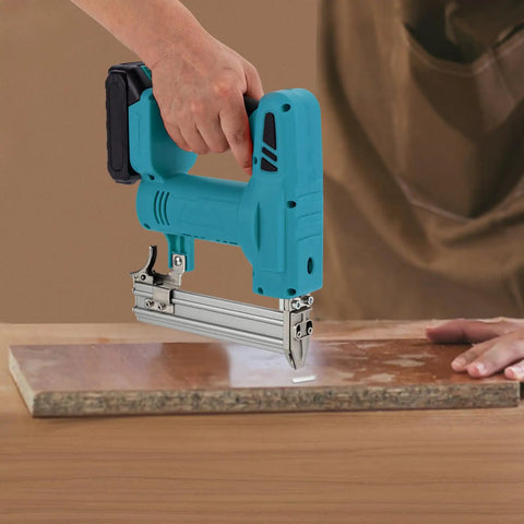 Top Shelf Cordless Brad Nailer 100W Copper Motor Shoots Smooth At 80 Nails Per Minute Rust Resistant Tip in use on wood surface.