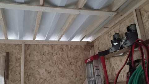 Installed Dry Under Deck Drainage System Roll For 50 Feet, Fits 12 Inch Joists, 30 Mil Thick Black Trough Top, White Downside