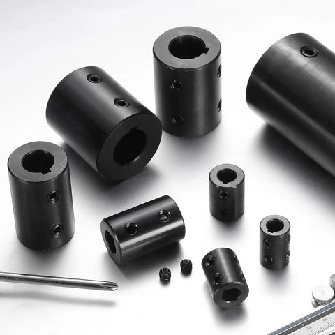 Rigid Shaft Coupling Built To Last For Motors And 3D Printers, Bore Three Quarters Inch, Outside Diameter One And Half Inch, Length Two Inches, Black Oxide Plated ASTM1045 Steel, With Two Set Screws, Durable High Precision Coupler, black rigid couplings shown with set screws