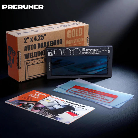 Flex Series Red Shade 5-13 Auto Darkening Welding Lens 2x4-1/4 with packaging and instruction manuals on a table.