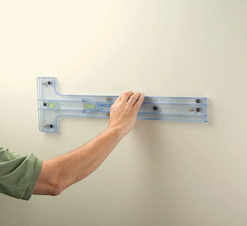 Installing Glyde Brushed Nickel Wall Mount Robe Hook with Pro-Fit Easy Install Template on bathroom wall