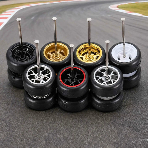 8 Piece 1 64th Scale Wheels And Tires Set With Real Riders Rims And Axles For RC Diecast Cars And DIY Models arranged on track