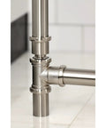 Close-up of brushed nickel finish on solid brass Tub Waste And Overflow Drain Assembly With Double Pivoting Action, Toe Touch Stopper