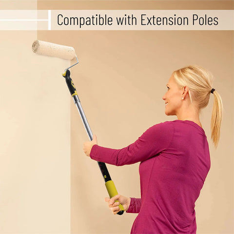 Paint Roller Kit With Nine Inch Frame And Two Microfiber Covers For Walls Ceilings And Floors One Half Inch Nap Designed For Fast DIY Home Painting Projects With Easy Grip Handle And Smooth Application being used by a person on a wall, showing extension pole compatibility.