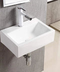 Rectangular White Porcelain Wall Mount Bathroom Sink With Hardware Included Measures 16.75 Inches Long By 12 Inches Wide By 5.125 Inches High