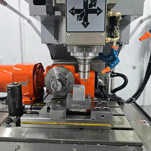 Heavy Duty Self- Centering Vise With Quick Clamp For CNC Milling Machine Precision 4/5 Axis Fixture clamped on a CNC machine.