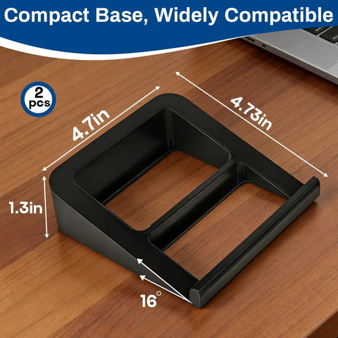 Pair Of Desktop Speaker Stands For Small Monitors With 16 Degree Tilt Wedge Shaped Riser And Shock Absorbing Foam on table
