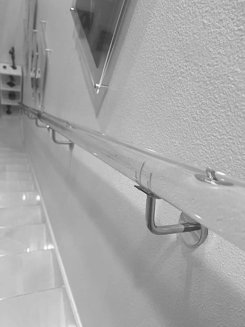 Clear Acrylic Handrail Kit Custom Lucite Stair Rail Hella Durable Wall Mount Bracket Non Slip Grip Handle Super Tough Safety Guard For Home Stairs, installed at an angle.