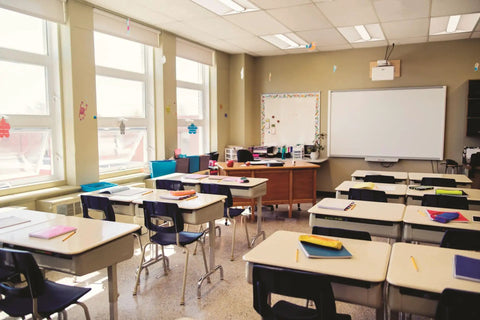 Classroom with 2x2 LED Troffer Light BLT Series Low Profile Drop In Ceiling Light For Dropped Ceilings With Curved Ribbed Diffuser 3300 Lumens 3500K Neutral White.