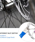 Bike Disc Rotor Truing Fork Tool Wrench with dual 15mm/46mm slot depths, in use on MTB brake rotor, ergonomic handle detail.