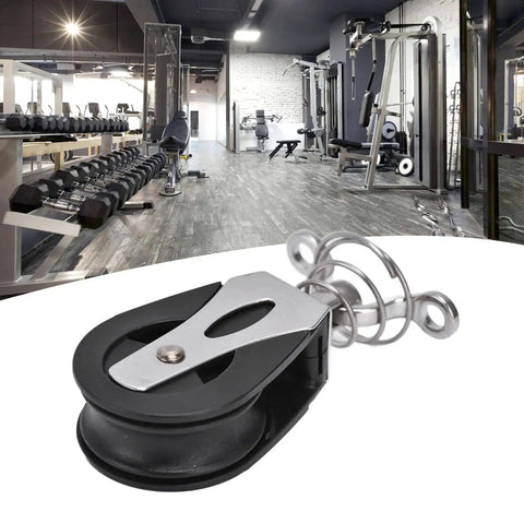 Beefy Nylon Swivel Sheave Block Pulley For Marine Rigging And Fitness Gear, 316 Stainless Steel displayed in a gym setting