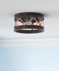 Chatham Flush Mount Light in gunmetal bronze with rustic coastal style, nautical rope accents, and cleat details on ceiling.