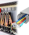 Solid Grey PVC Conduit Trunking With Secure Snap Fit Cover For Ultimate No Fuss Wire Management, Legit Open Slot Cable Raceway For Clean Cord Organization And Sleek Wall Routing Solutions, 50 Piece Pack with wires inserted.