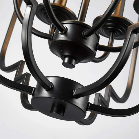 Close-up of Six Light Black Farmhouse Chandelier With Globe Metal Pendant Lighting For Dining Room Living Room Kitchen And Foyer, Width 23 Inches Height 26 Inches, Adjustable Chain Up To 60 Inches, LED Compatible E12 Bulbs Not Included, focusing on the metal framework.